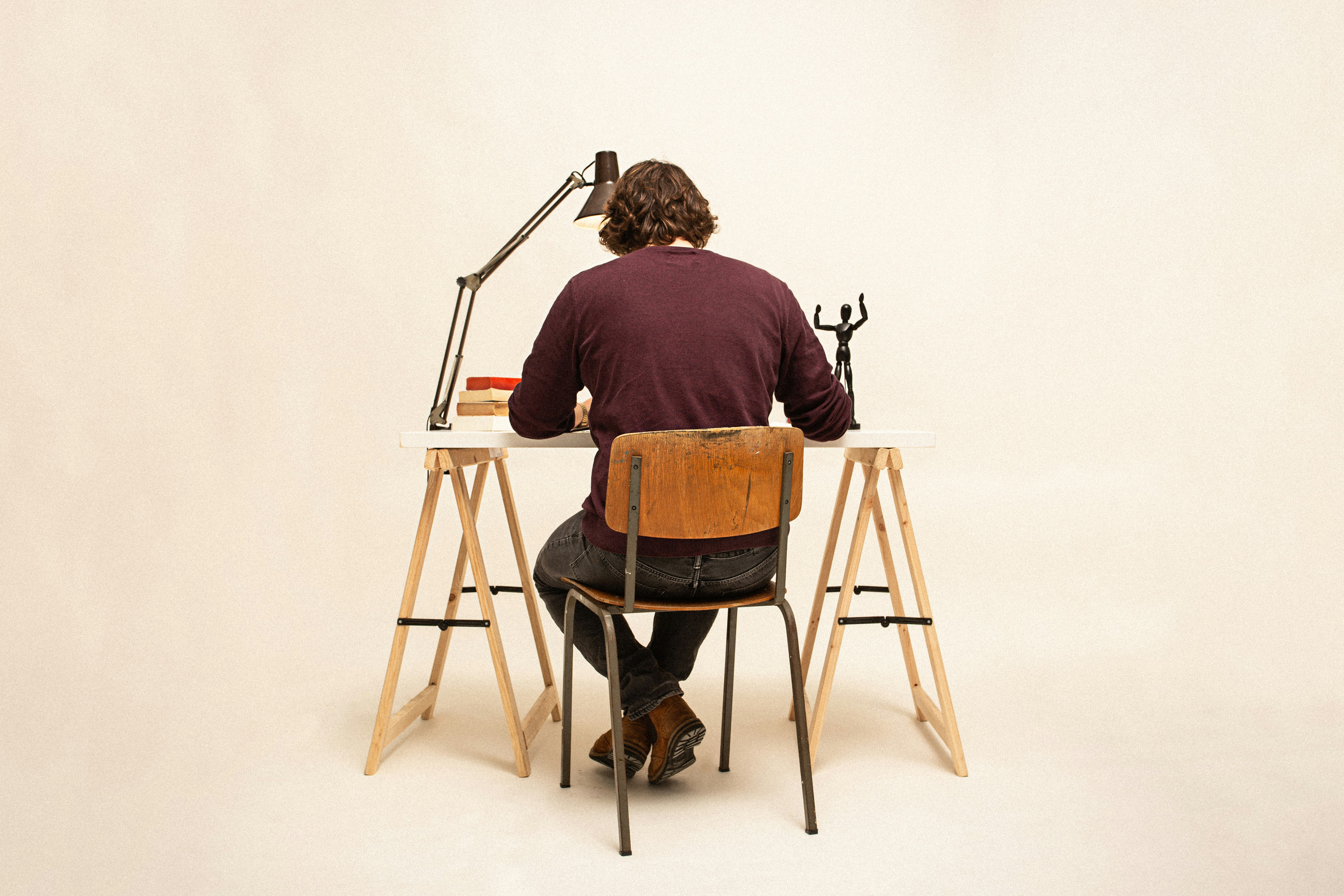 A man is sitting at the table