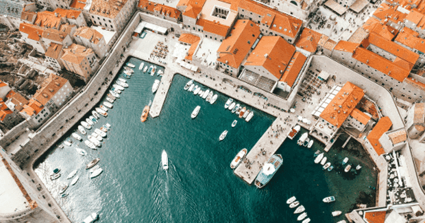 port in croatia with red houses