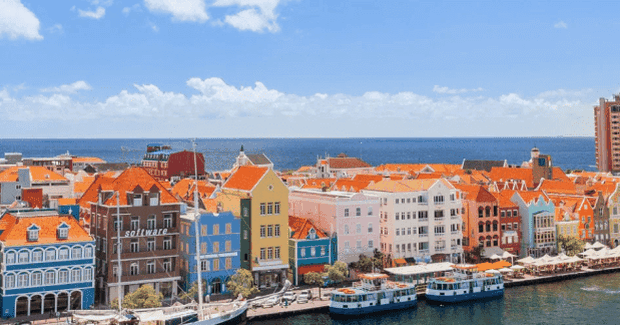 colorful apartments lined up on the port