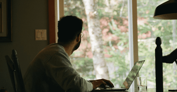 Man looking at window