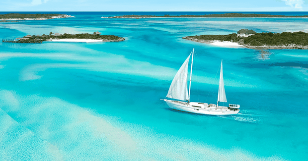 sailboat on crystal clear water