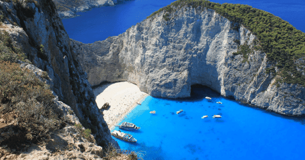 blue waters inbetween cliffs