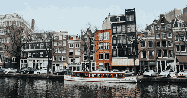 buildings on river in netherlands