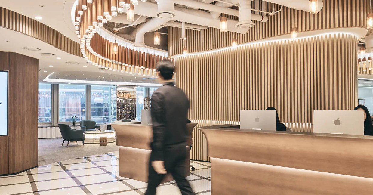 A man at the reception desk