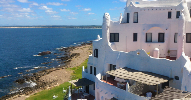 white house on cliff ocean view